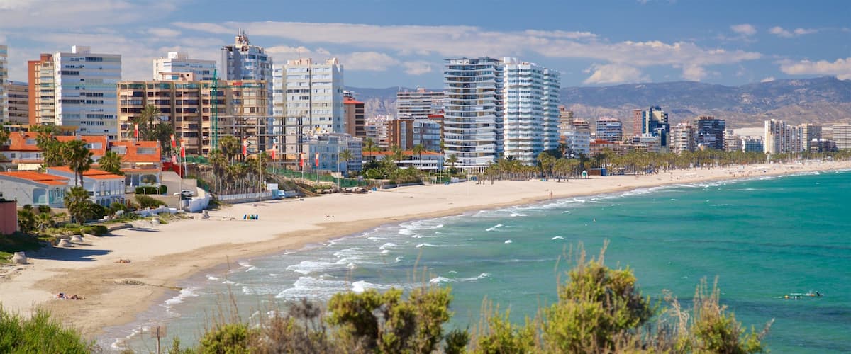 Cabo de las Huertas which includes landscape views, a coastal town and a beach