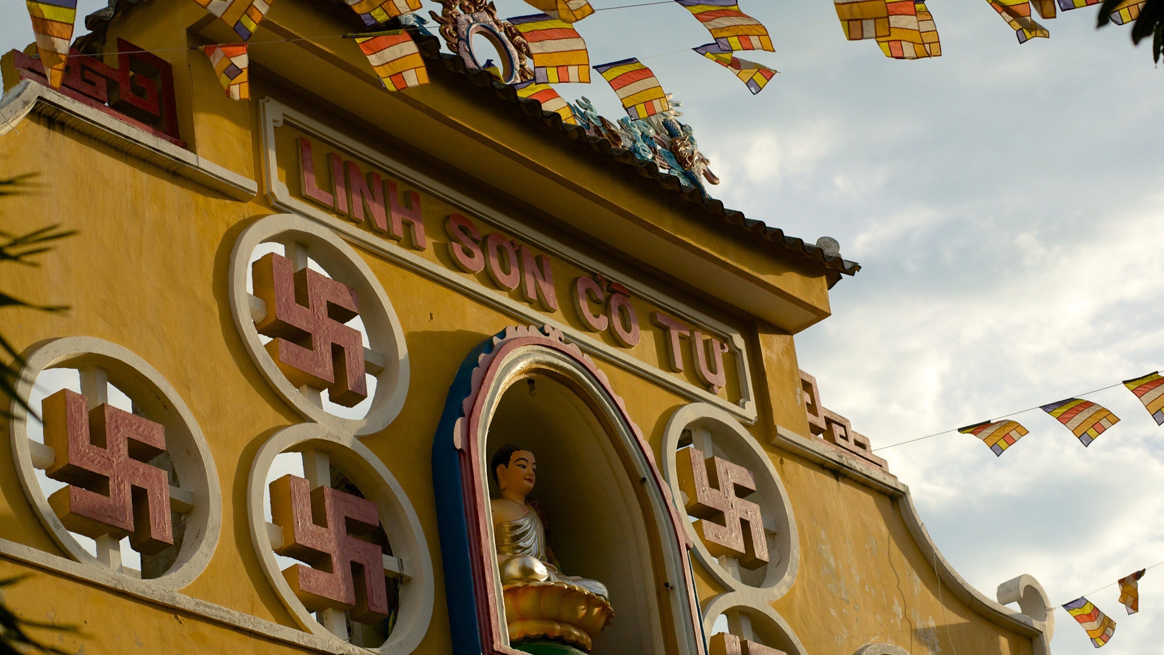 Linh Son Co Tu which includes religious aspects and a temple or place of worship