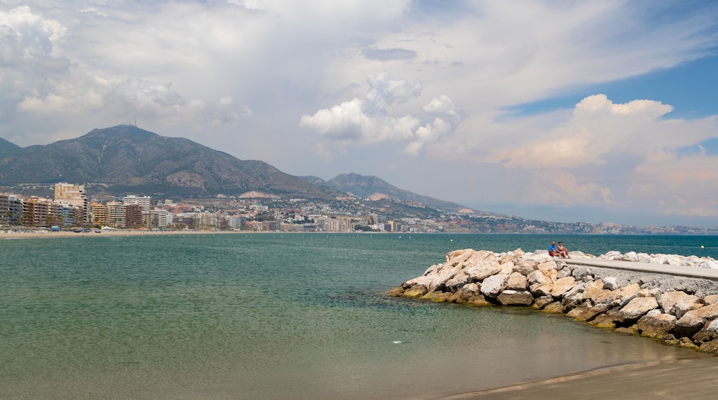 Los Boliches Beach showing general coastal views and a coastal town
