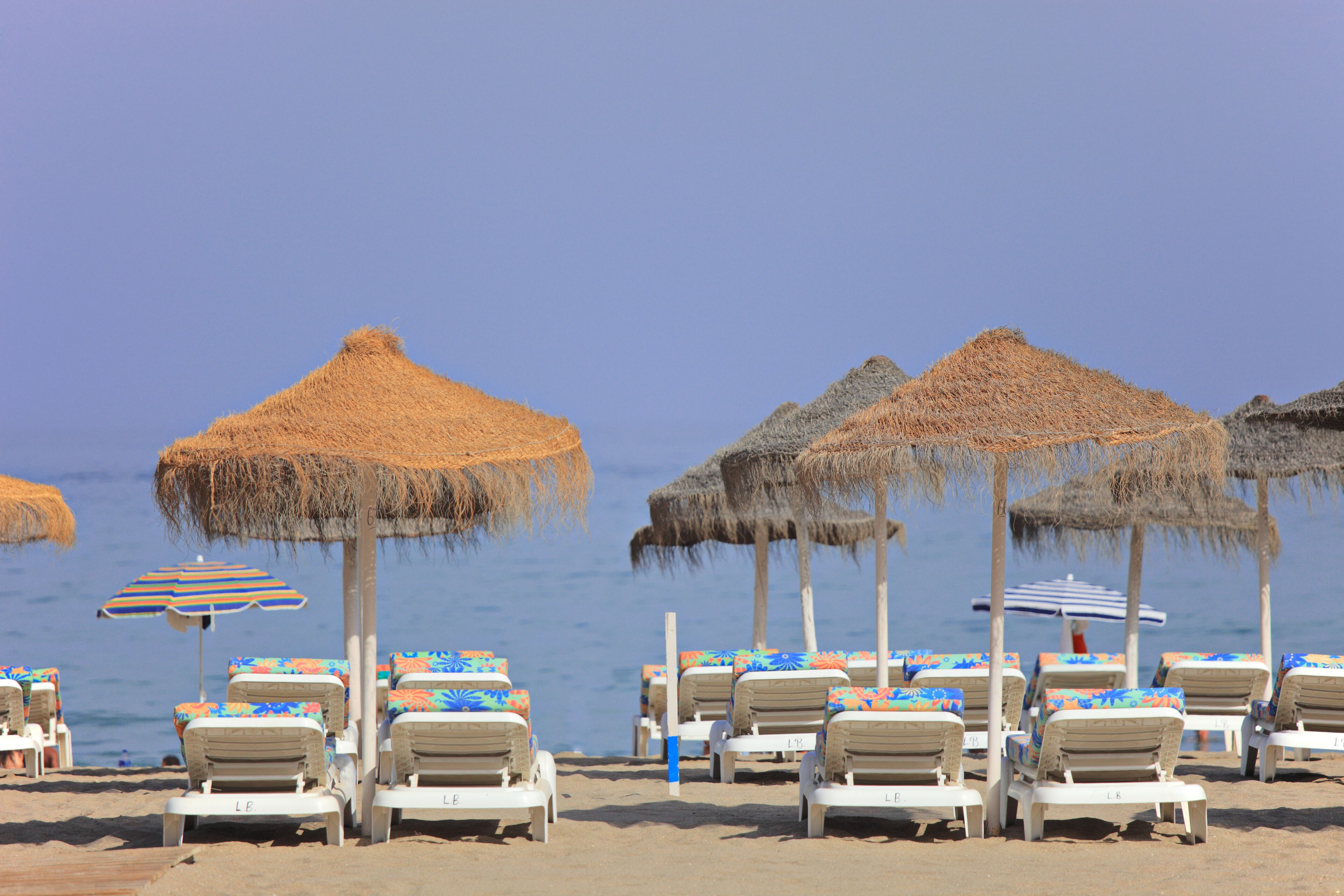 Beach beds at Los Boliches beach, Fuengirola, Spain; Shutterstock ID 35592238; purchase_order: Comps; job: ; client: ; other: