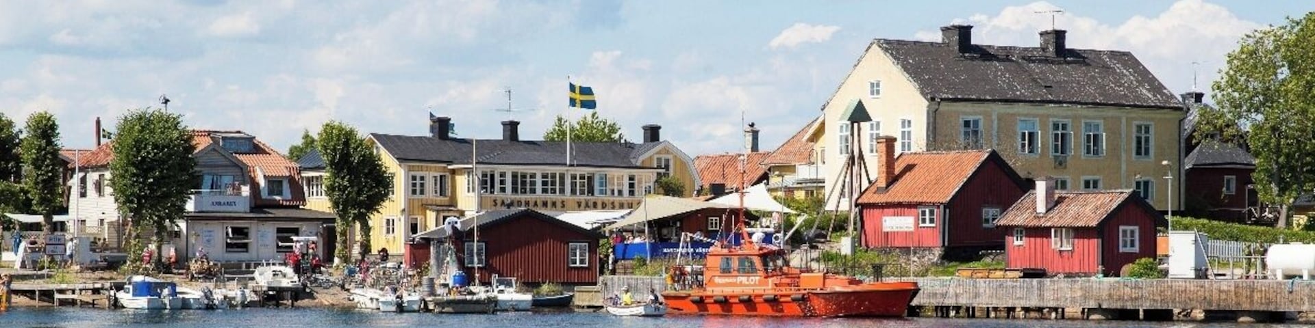 Sandhamn is an island in Stockholm's archipelago, and the last stop before reaching the Baltic Sea. It is accessible by a two and a half hour ferry ride from Stockholm. We used Cinderella Batarna. Sandhamn is a great day tip from Stockholm. We went cycling around the island, had lunch at an outdoor cafe, went to the beach (the water was surprisingly warm), and took the kids mountain biking for their first time. For more information visit http://www.earthtrekkers.com/day-trip-sandhamn-sweden/ 