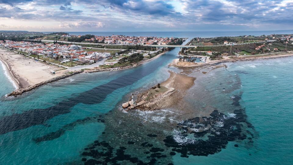 Aerial view at Nea Potidea canal, which connects Toroneos Bay with the Gulf of Thermaikos. Greece, Kassandra, Halkidiki