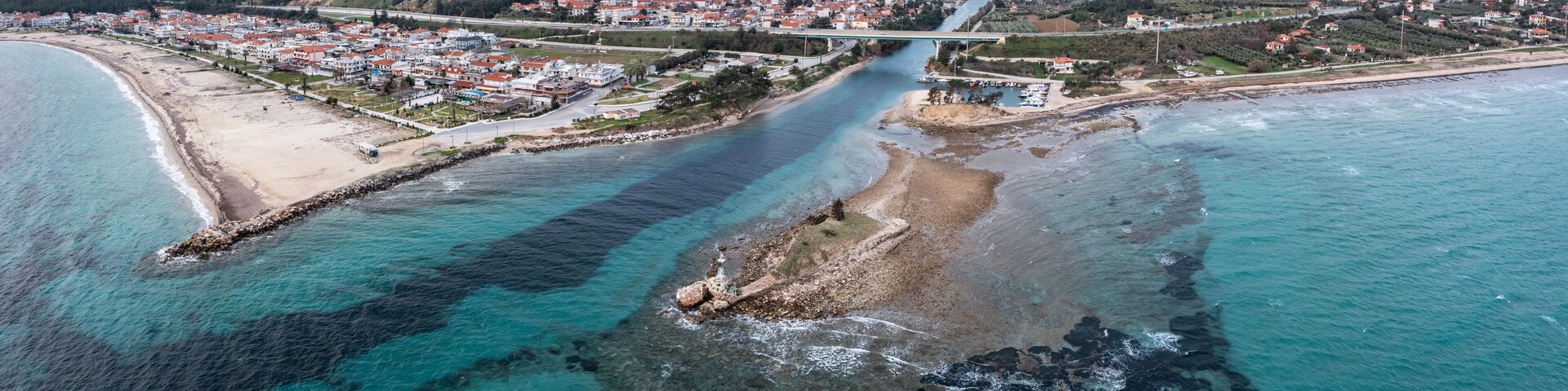 Aerial view at Nea Potidea canal, which connects Toroneos Bay with the Gulf of Thermaikos. Greece, Kassandra, Halkidiki