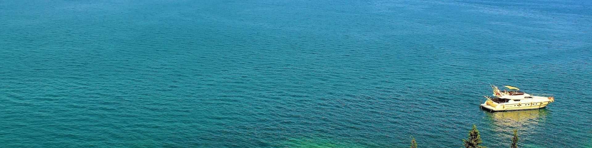 I took this photo in Alanya, Turkey last June! It's a great view from the Alanya Castle walls! I loved walking by and seeing the beautiful, colorful sea. And the great Taurus Mountains in the distance. And all the lovely boats passing by. It was a very hot summer day, but the views made it worthwhile. And the sense of adventure! :)