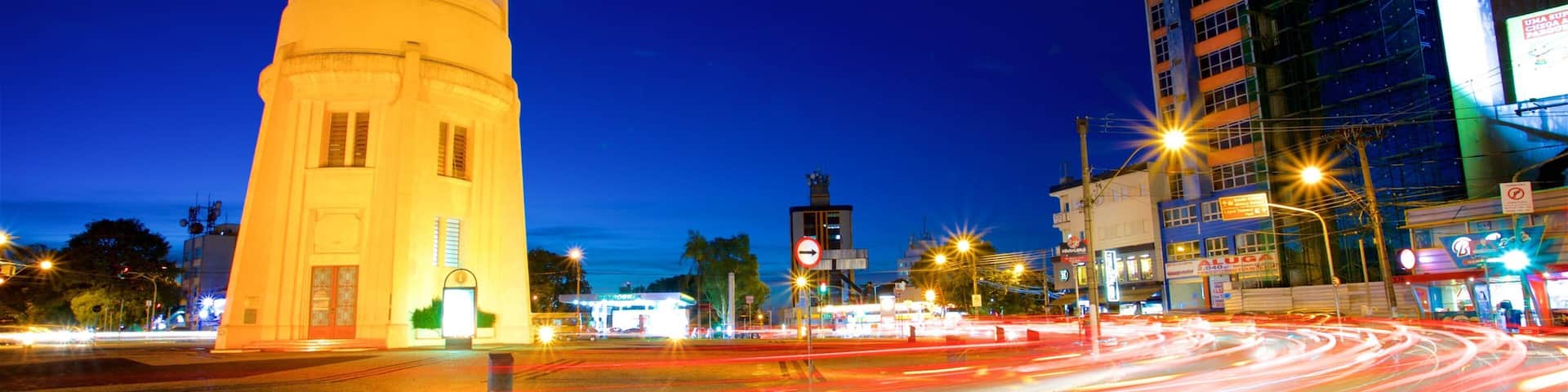 Castle Tower featuring a city and night scenes