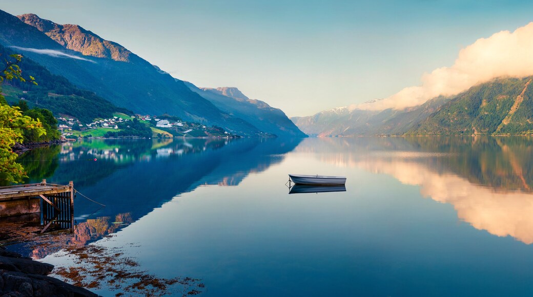 Beautifel summer panorama on the Norwegian fjord, located near Lofthus village in Ullensvang municipality, Hordaland county, Norway. Beauty of countryside concept background.