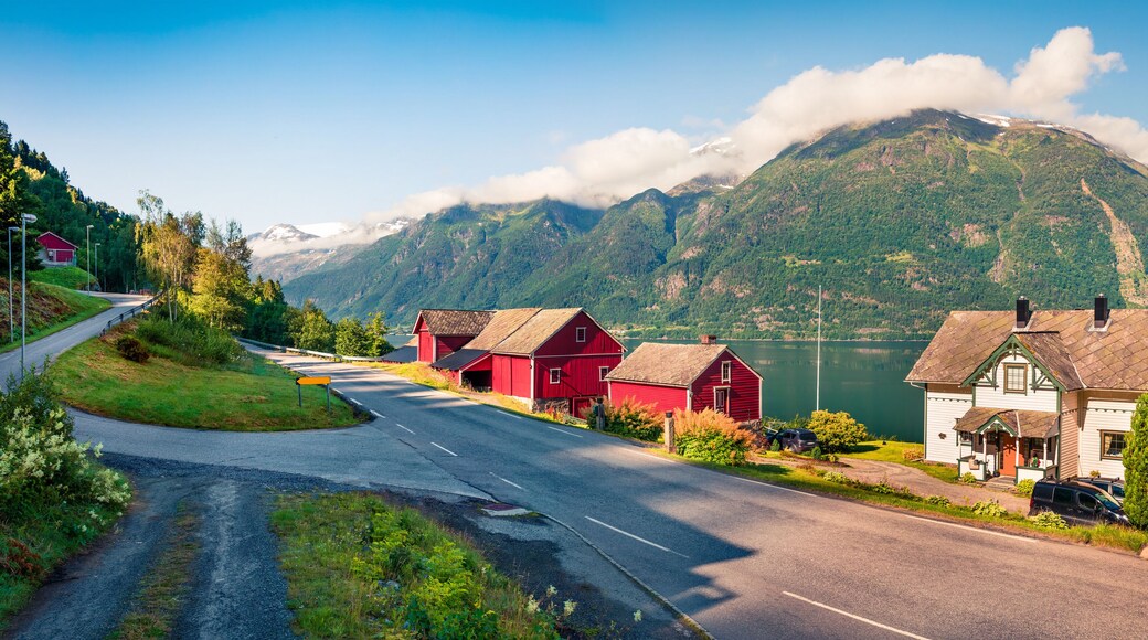 Sunny summer panorama of the Lofthus village in Ullensvang municipality which is located in the Hardanger region of Hordaland county, Norway. Beauty of countryside concept background.
