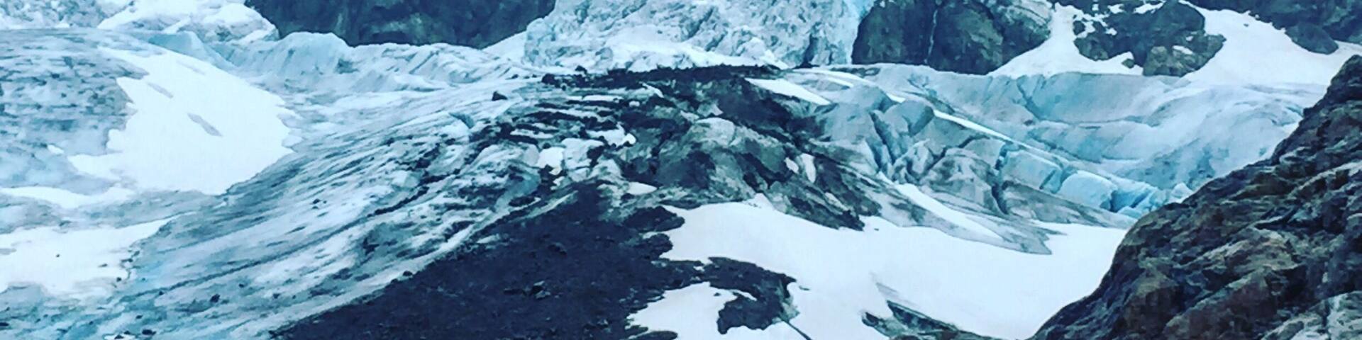 It took us around two hours to get to the glacier through heavy rain, sleet, rough terrain and wind which threatened to blow our brains away. Not the easiest hiking route, I have to admit (well, it might be if the weather is welcoming and you're wearing a nice pair of water resistant boots) needless to say we were lacking any of those (dumb us). At some points you literally have to balance on a rope (very wet with ice cold water streaming down the sleeves as you're grabbing it) 90 degrees up the rocks. The very end is breathtaking though-massive pile of snow, ice and waterfalls all pale blue as the air is ridiculously clean there. Take extra care, however, the surfaces, little bridges and pathways get really slippery if it rains. Avoid if you're travelling with small children.