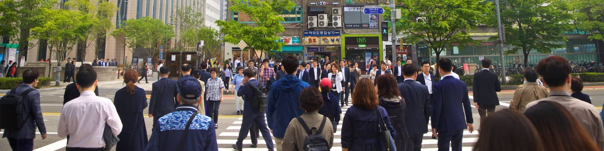 Yeouido showing street scenes and a city as well as a large group of people