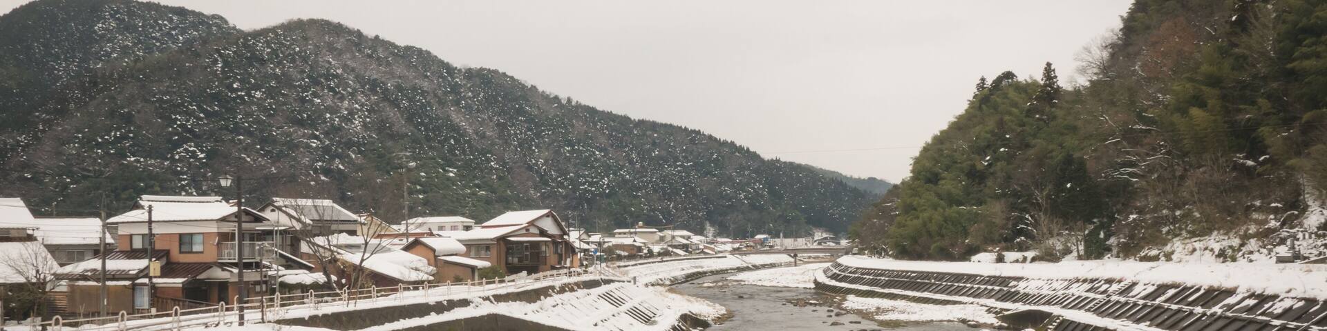 The tsuwano bridge that people used to travel was covered by snow after a blizzard.