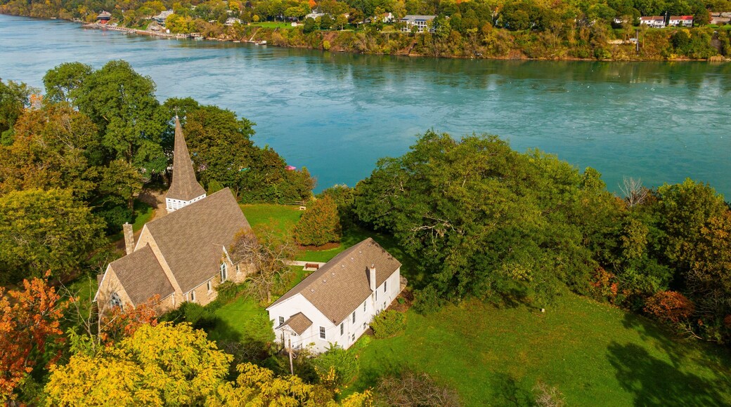 Queenston which includes landscape views, a river or creek and a small town or village