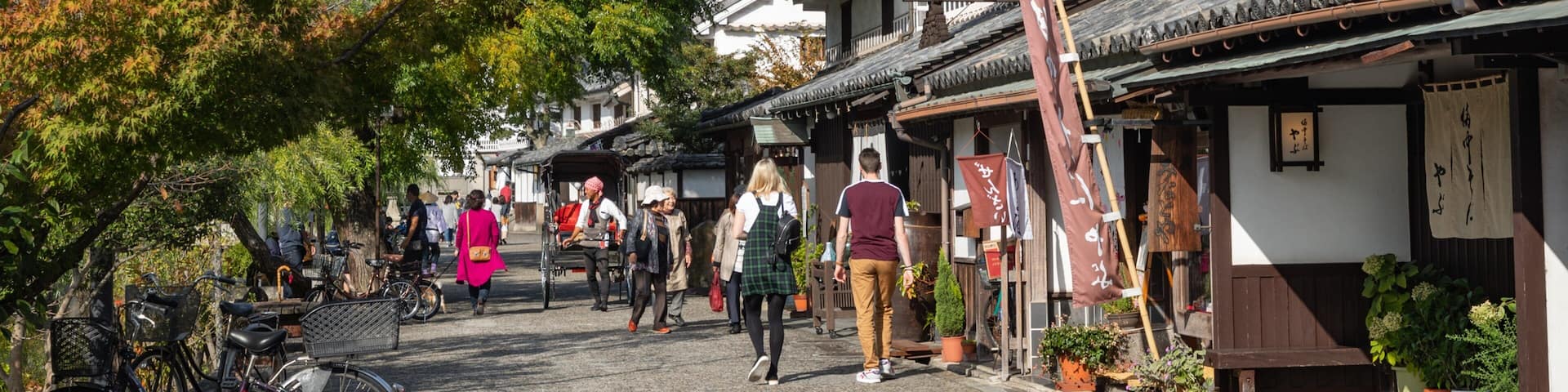 Bikan Historical Area featuring street scenes as well as a couple