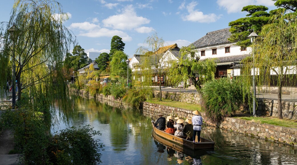 Bikan Historical Area which includes a small town or village, a river or creek and boating