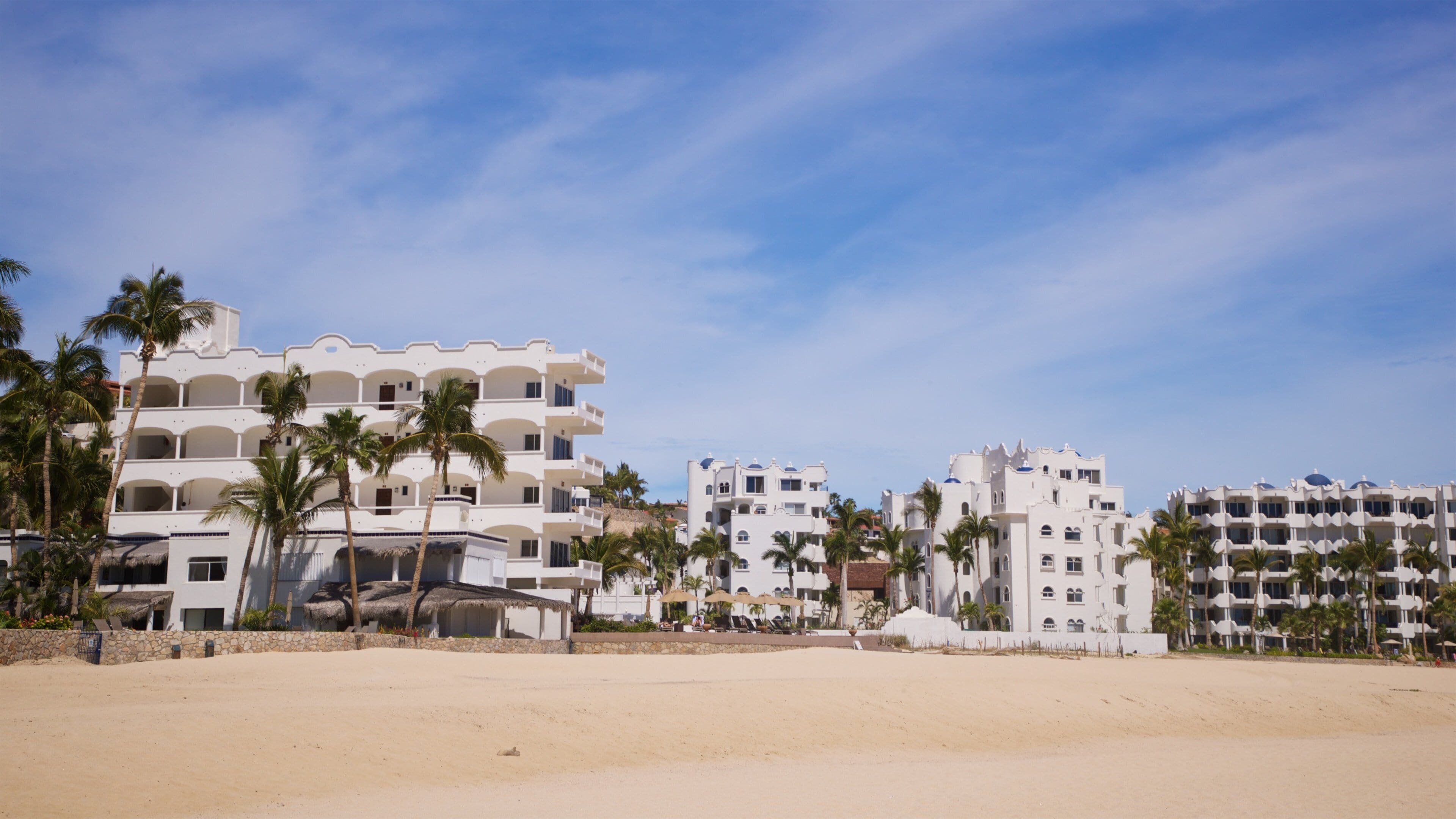 Costa Azul Beach which includes general coastal views, a beach and a coastal town