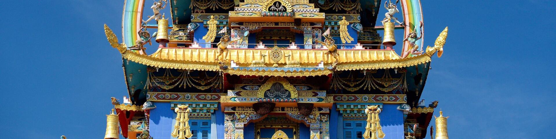 Golden Temple featuring religious elements and a temple or place of worship