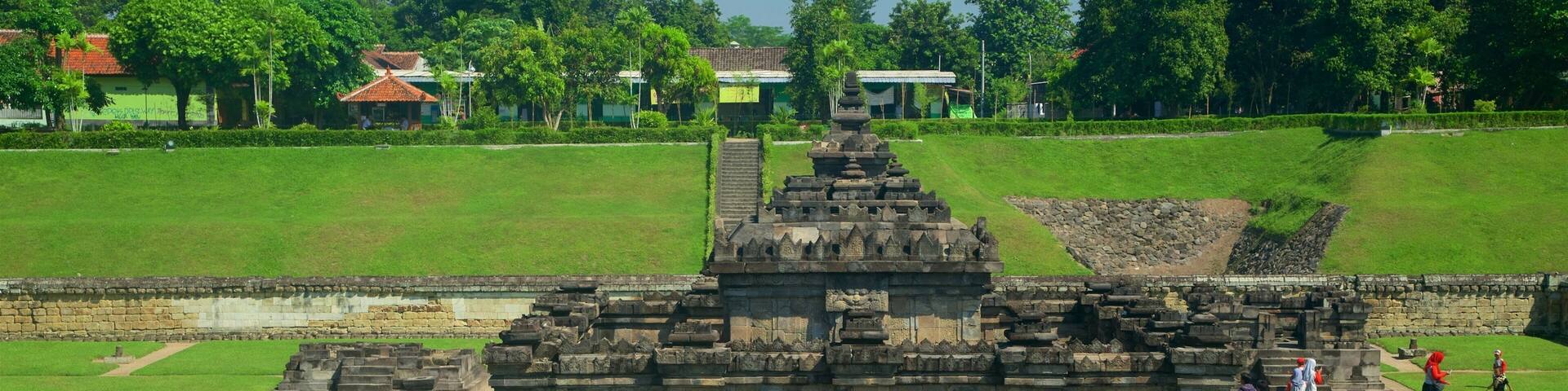 Sambisari Temple featuring a park, heritage elements and heritage architecture