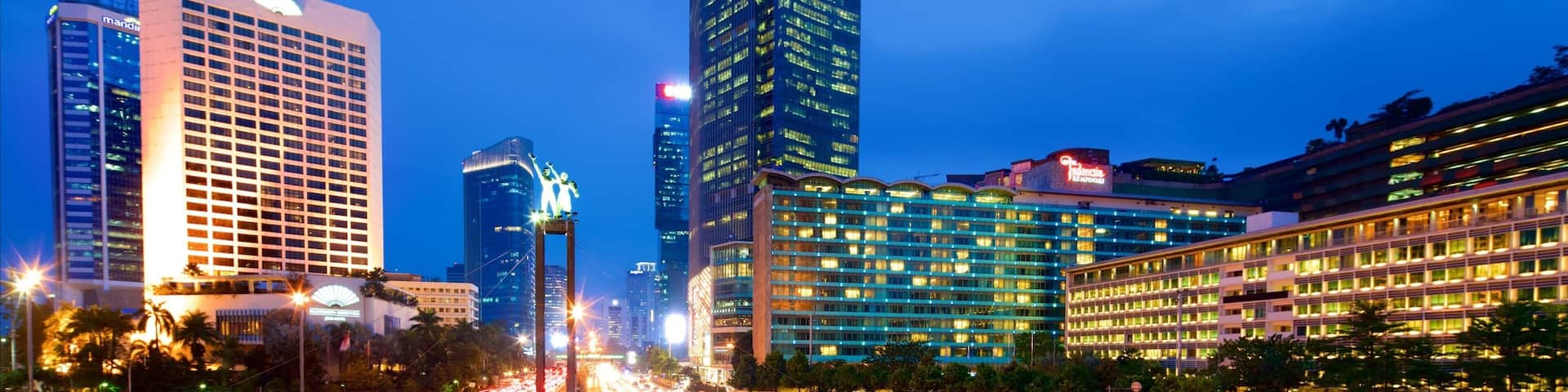 Bundaran Hi showing a fountain, a skyscraper and a city