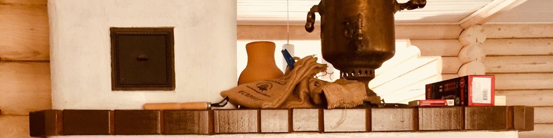 Private home stay in a magnificent two story traditional Russian log villa. The significance of this kind of a stove is that you can warm up with it, you can cook with it, you can sleep on it. Yes, right behind that samovar (still sometimes used for making tea), there is enough space to fit a person for a night. Unique experience! #TroveonTuesday