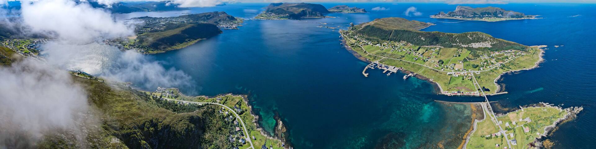 Aerial view of Dynamic fjord landscape in Norway with bridges connecting Islands in the Ocean