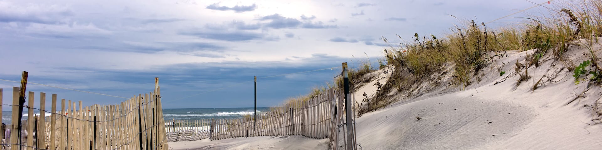 Path through sand dunes on a beach on Long Island, New York