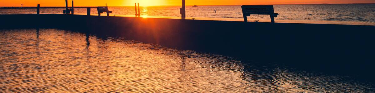 Dramatic sunrise. Sayville docks and marina. Long Island, New York .Atlantic ocean.