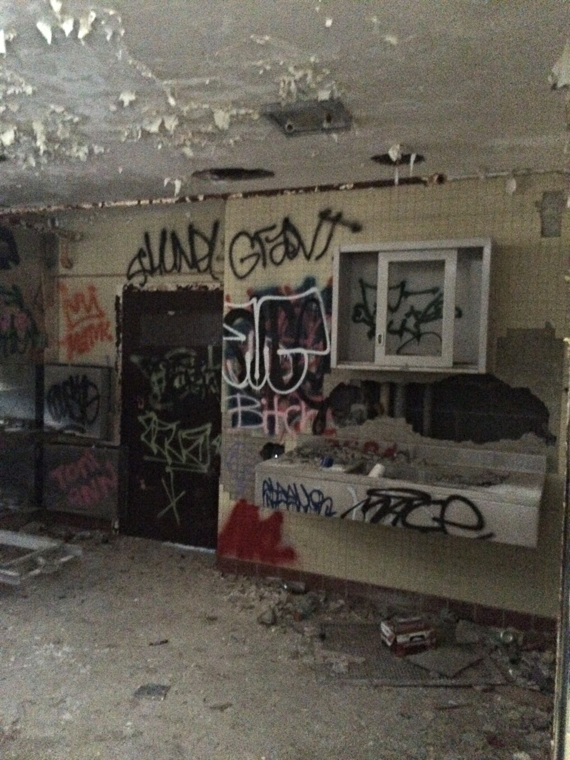 An old wash sink inside the morgue at kings park psychiatric center. If these walls could only talk..