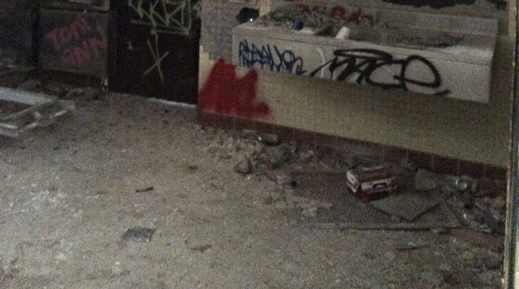 An old wash sink inside the morgue at kings park psychiatric center. If these walls could only talk..