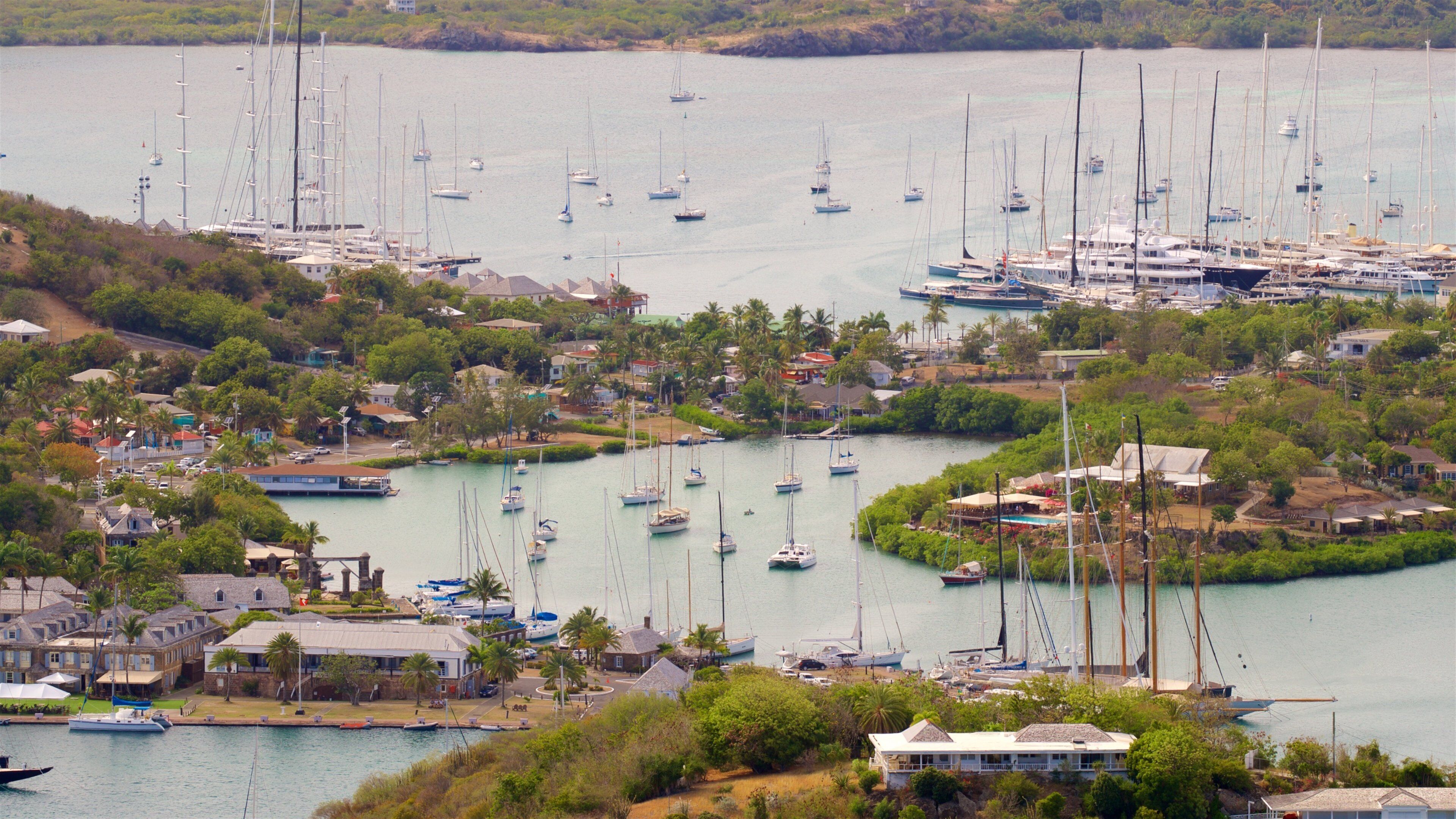 Shirley Heights showing a bay or harbor and a coastal town