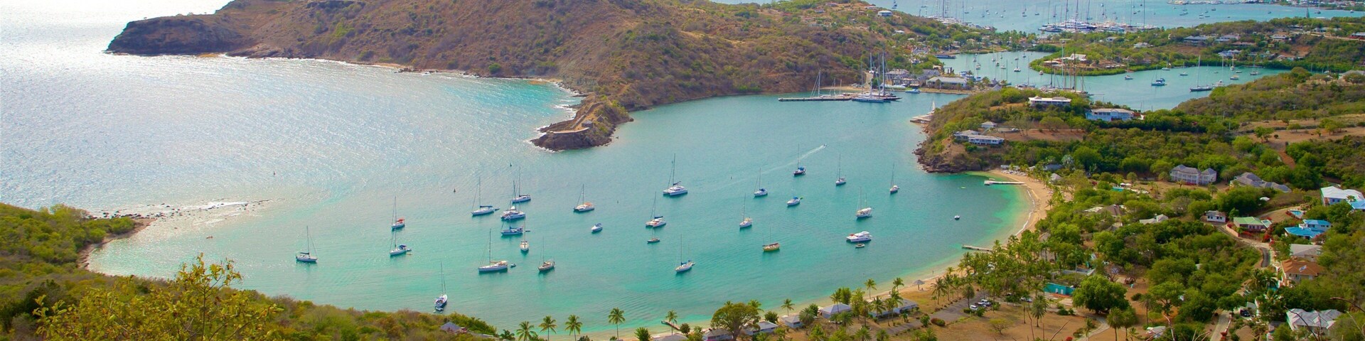 Shirley Heights which includes a bay or harbor, a coastal town and island views