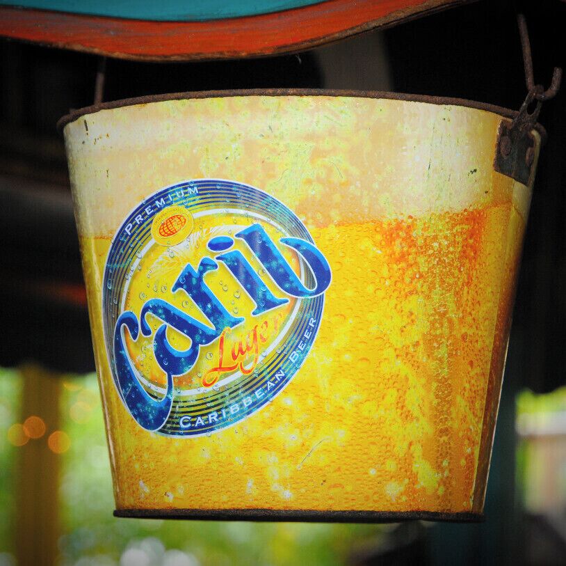 I'm trying to decide if I kicked the bucket or the bucket kicked me... .Same Difference... whatever that means.

Carib Beer, Damn good Beer ! When there is Carib on the beer menu chances are your in your "Happy Place."

Original Gravity 11.6 - 11.9°P
Alcohol by Volume: 5.1-5.4%
Bitterness (BU) 14-16
Colour 5.5 - 7.5 EBC
Calorific value 120kcal/275ml
