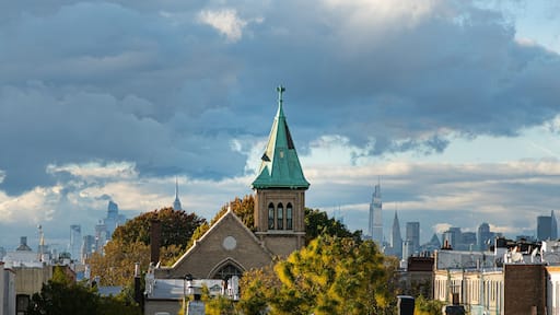 Skyline NYC from Ridgewood Queens , looking down perspective on to street wives