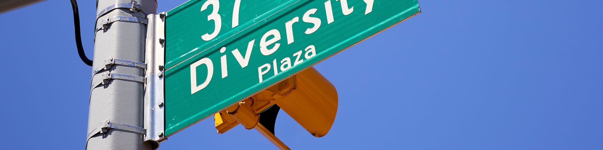 Diversity Plaza street sign, Jackson Heights, Queens, New York, USA