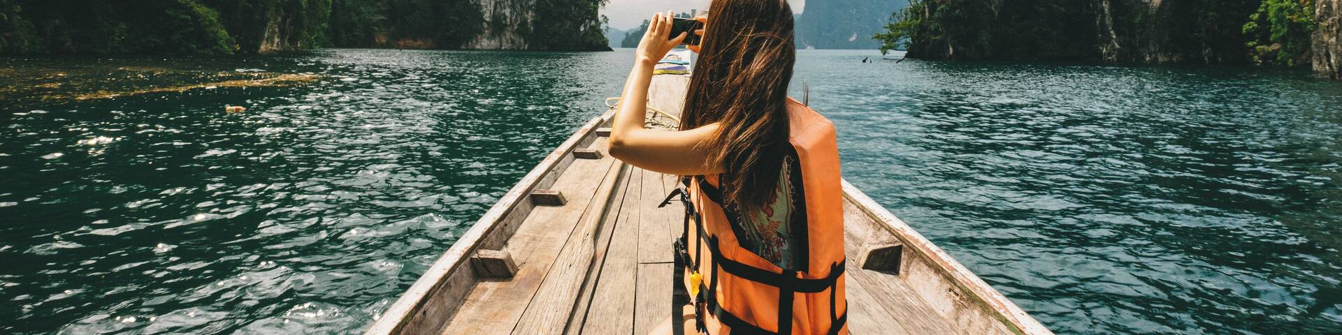 Exploring by longtail boat - Cheow Lan lake in Khao Sok National park, Thailand