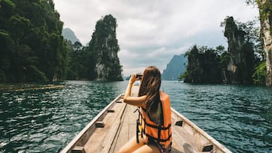 Exploring by longtail boat - Cheow Lan lake in Khao Sok National park, Thailand