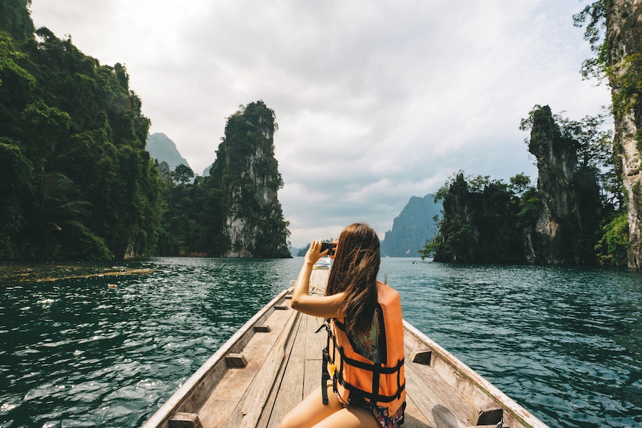 Exploring by longtail boat - Cheow Lan lake in Khao Sok National park, Thailand