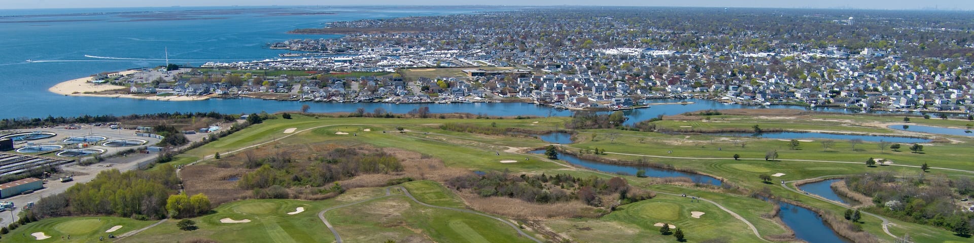 Aerial view of Bergen Point Golf Course and Long Island Coast