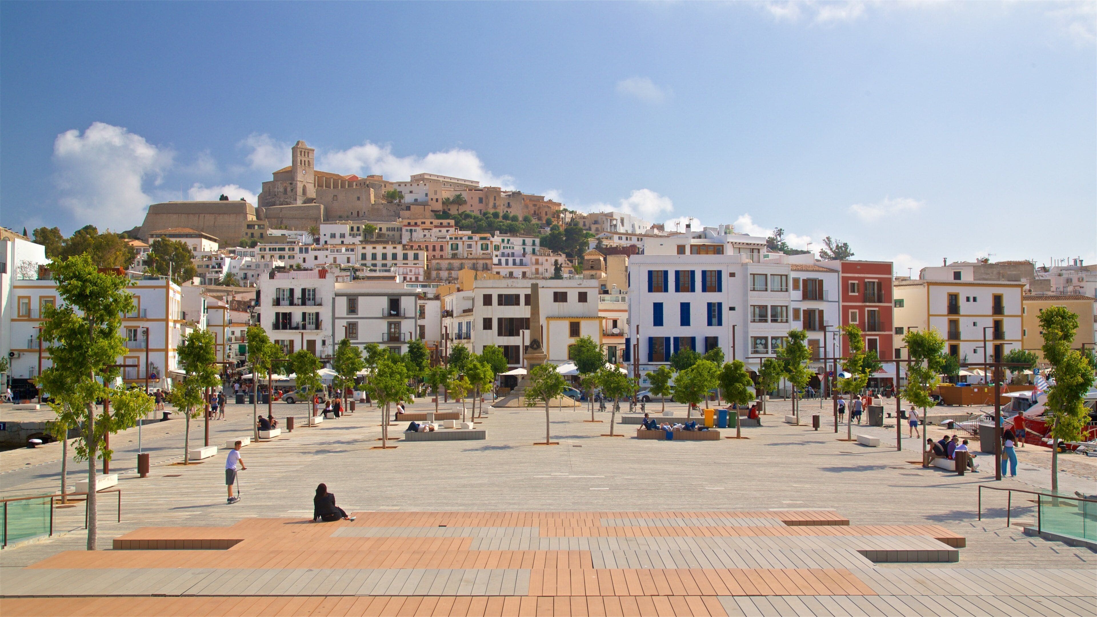 Port of Ibiza showing a city and a square or plaza