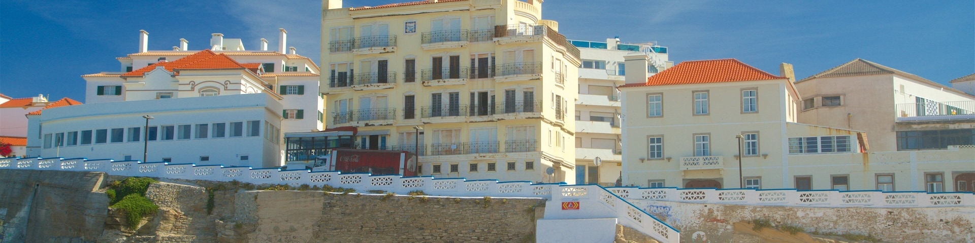 Macas Beach which includes a sandy beach and general coastal views