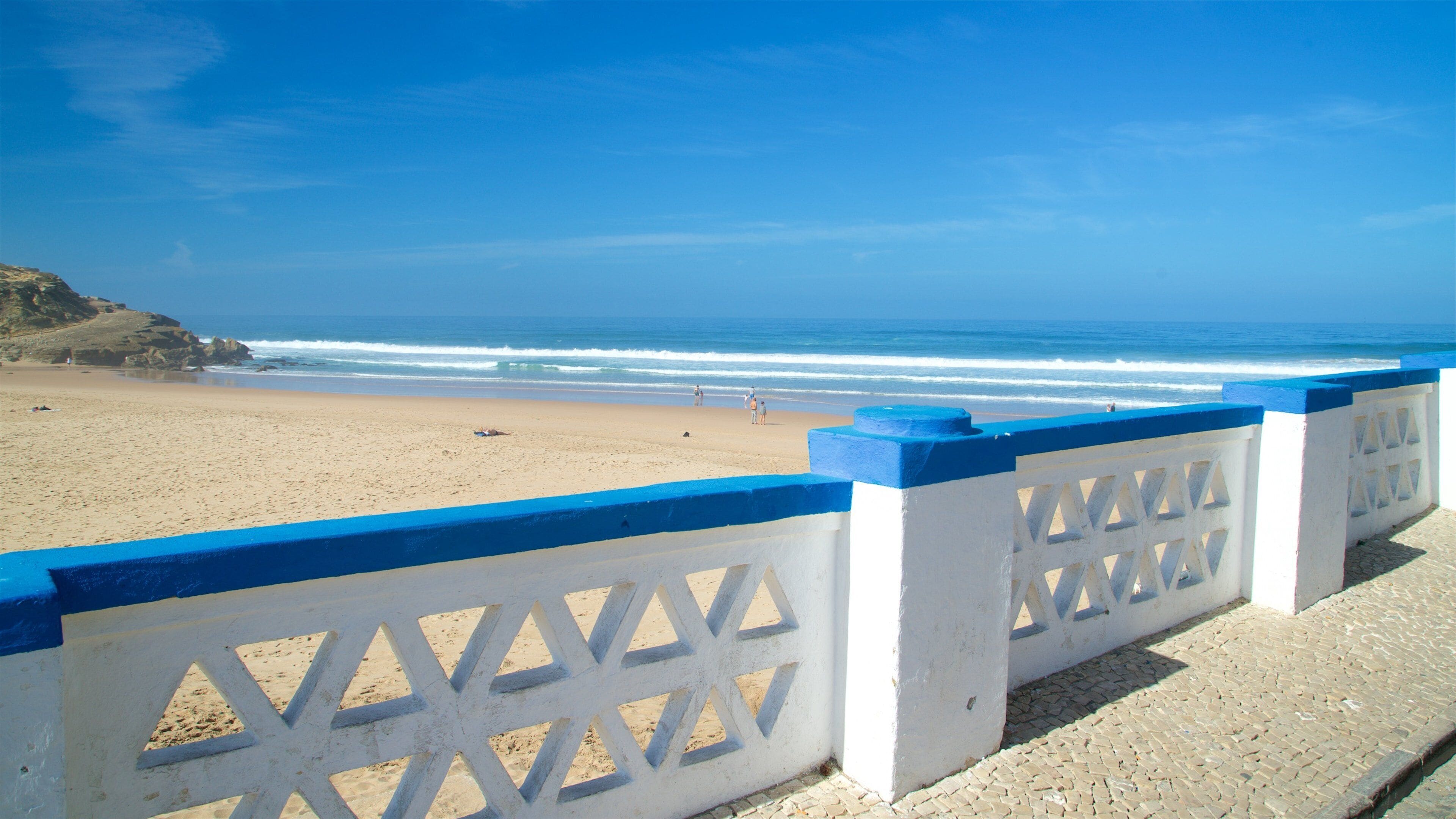 Macas Beach which includes a beach and general coastal views