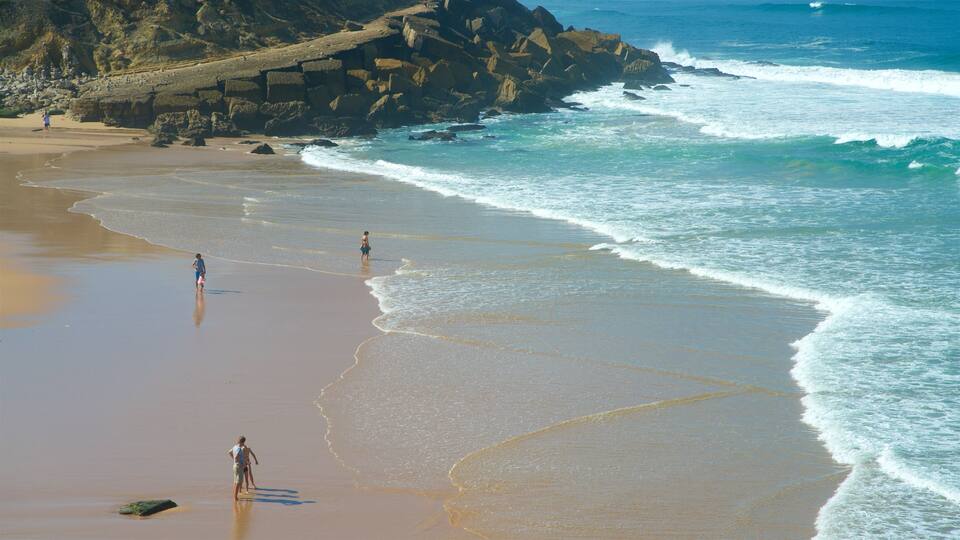Macas Beach showing a sandy beach, rocky coastline and general coastal views
