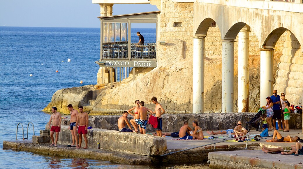 Balluta Bay which includes heritage architecture as well as a large group of people