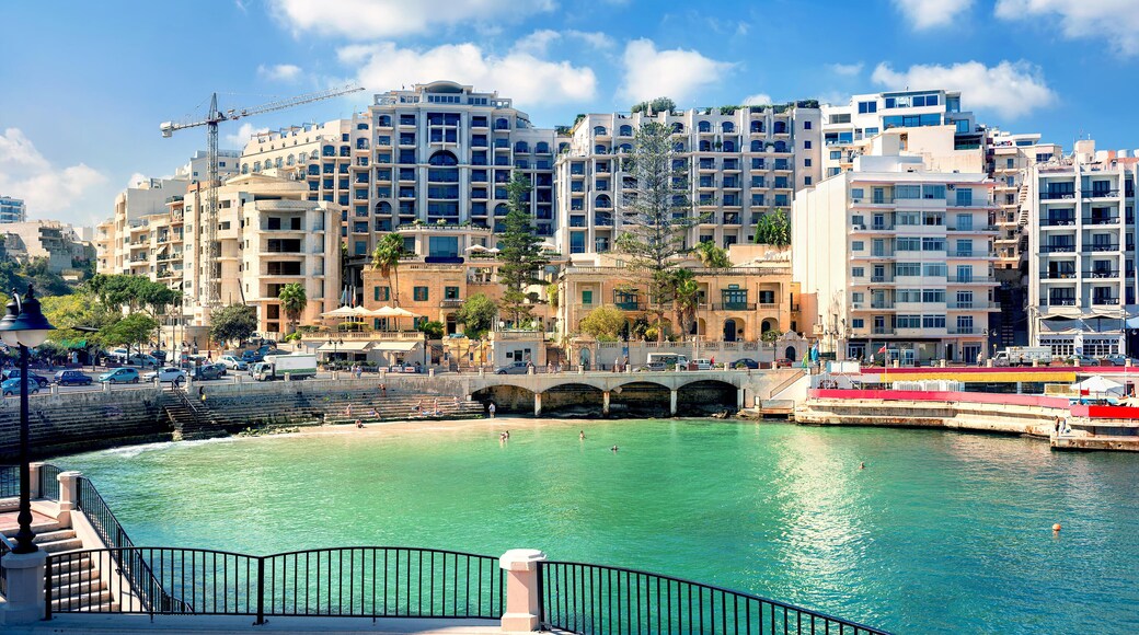 FP8E7H Cityscape with Spinola bay, St. Julians in sunny day, Malta