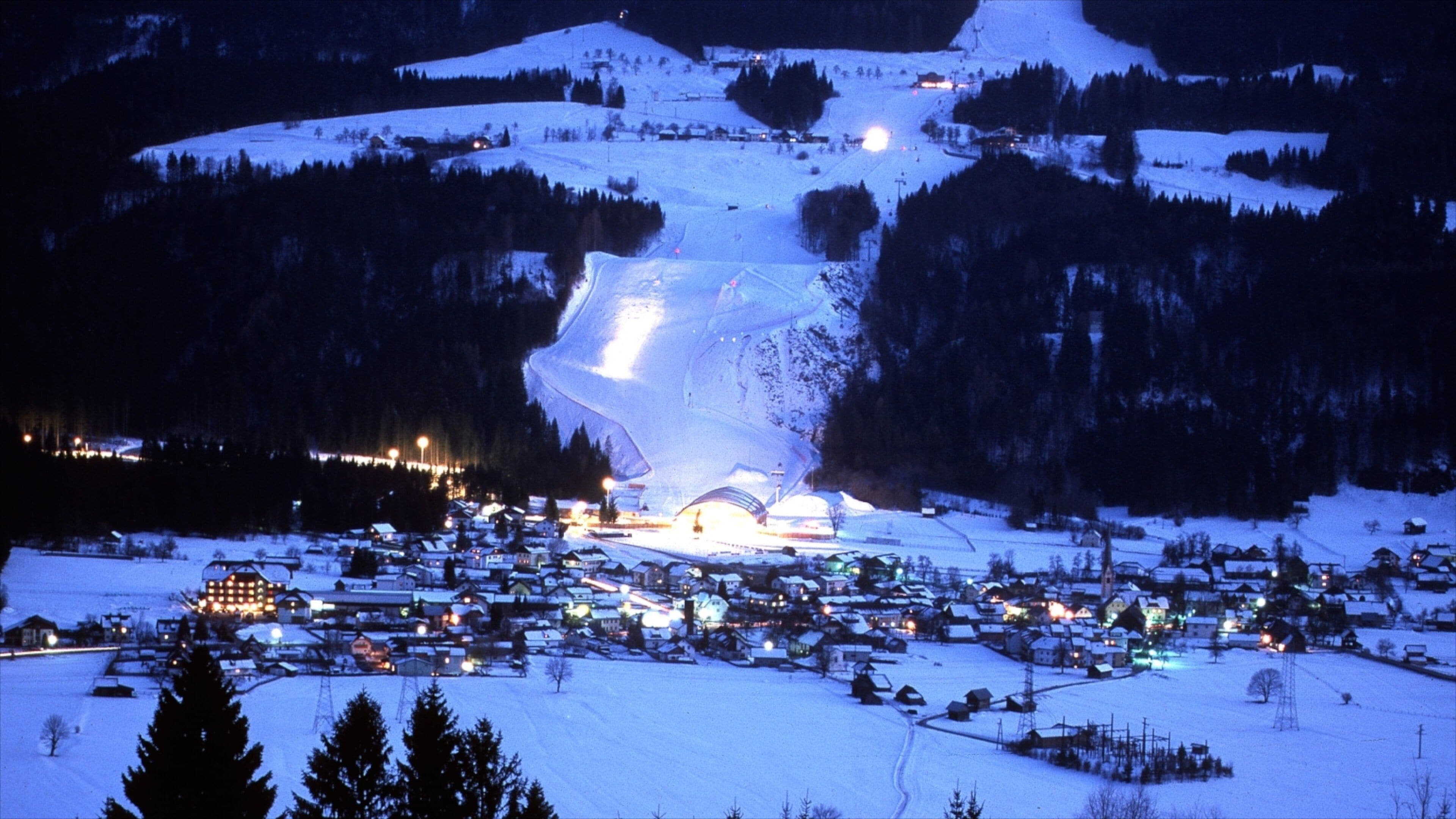 Nassfeld-Hermagor Skiing featuring a small town or village, snow and night scenes