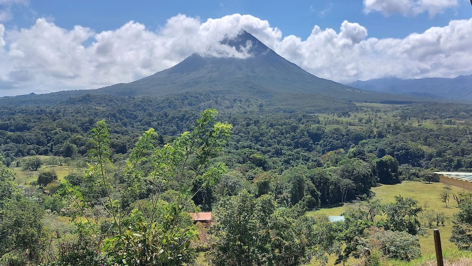 Beautiful view of the arenal volcano with jungle at front in la fortuna costa rica