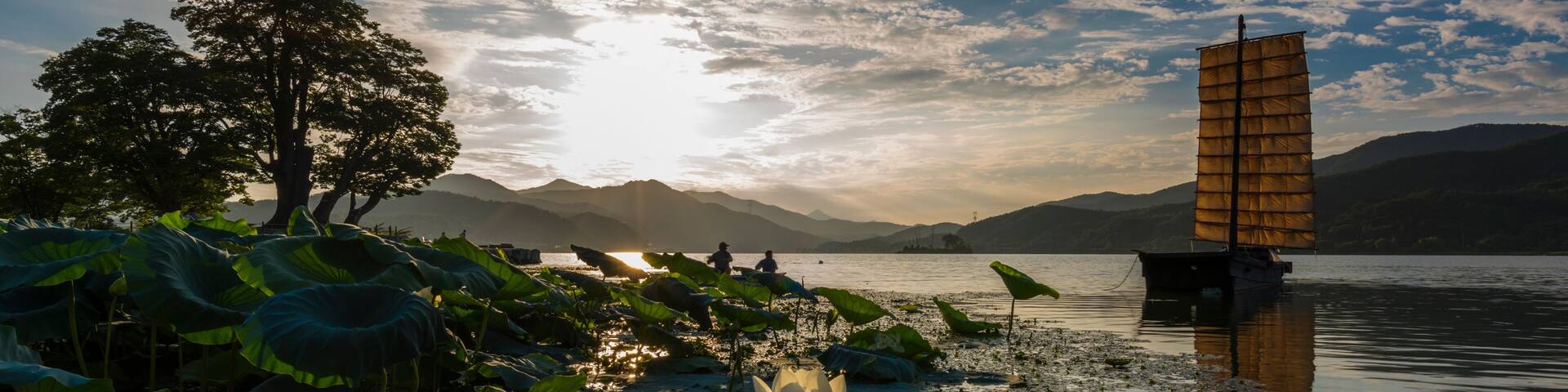Two men sailing on a lake, Dumulmeori, Yangpyeong, South Korea