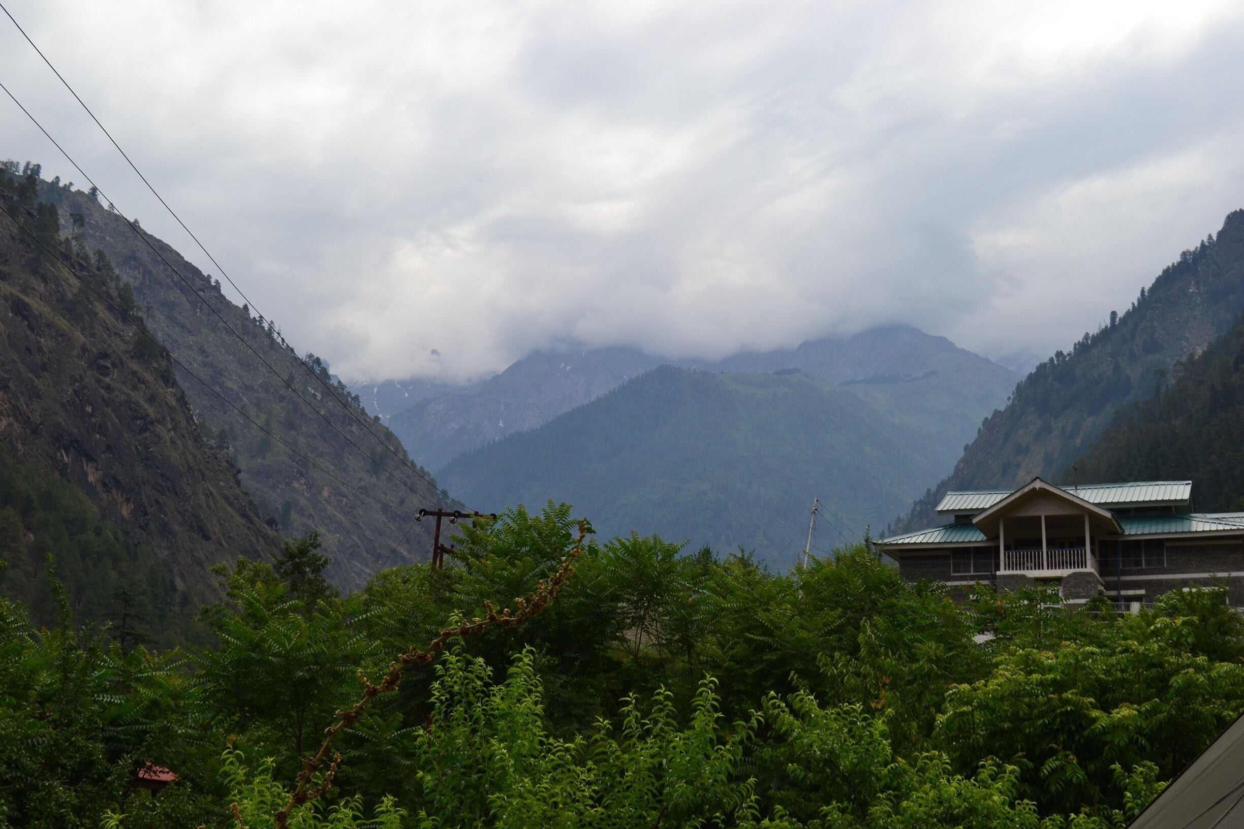 Windows open to d view of hills in Kasol....The ice capped ones being held for the view work ....