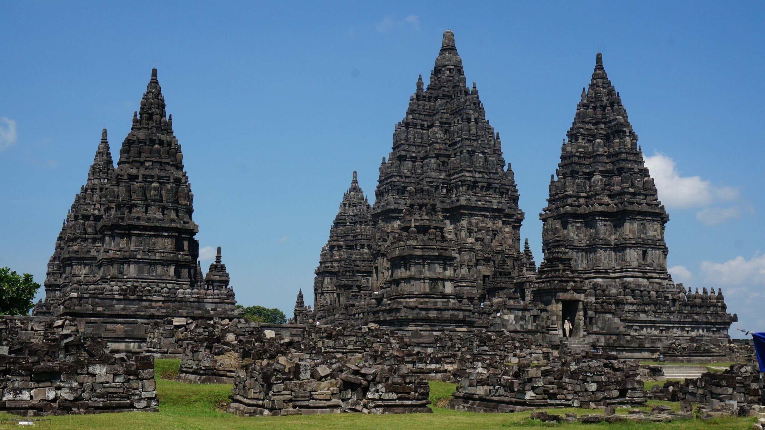 The beautiful Prambanan Temple located just outside Yogyakarta, Indonesia is quite the site to explore. The temple complex is home to some 240 temples though many are in piles of rubble as they were destroyed over the years. Built in the 10th century this UNESCO World Heritage Site is the largest Hindu temple site in Indonesia and one of the largest in South East Asia. Many people visit the area to see the famous Borodubur Temple, its definitely worth the time to explore Prambanan as well. #StunningStructures