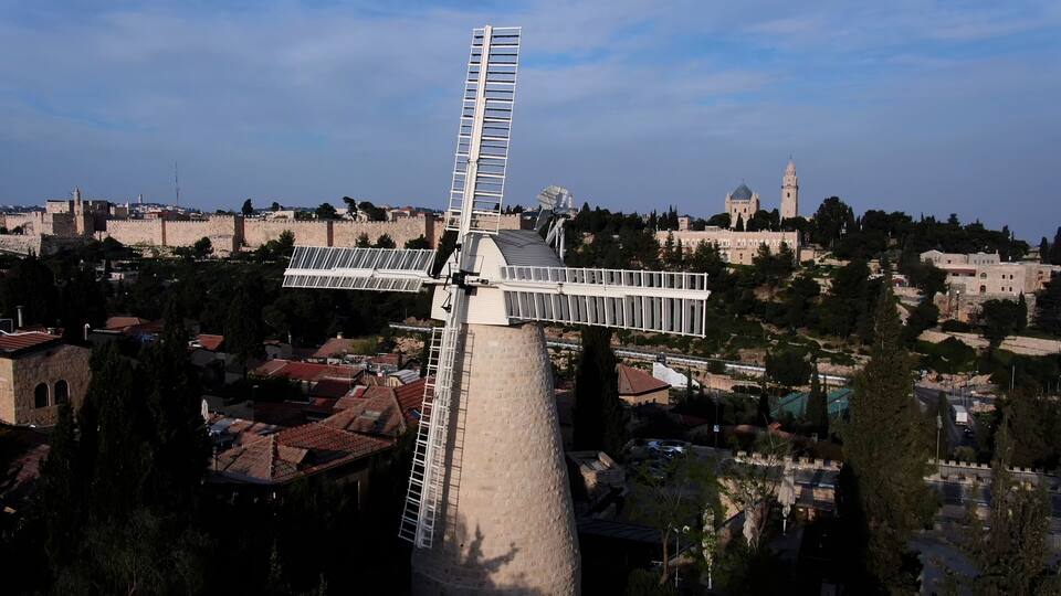The old city of Jerusalem Montefiore Windmill, aerial view
Montefiore Windmill also known as the Jerusalem Windmill and Yamin Moshe, at sunset, 2022, israel, drone view