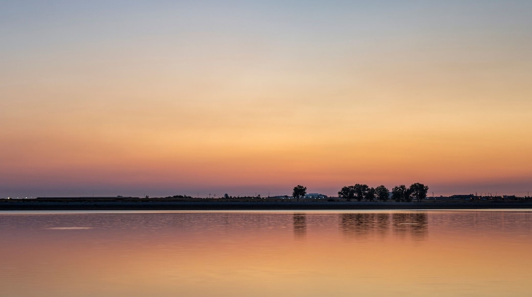 summer dawn over a calm lake - Boyd Lake State Park, popular boating and recreation area in northern Colorado
