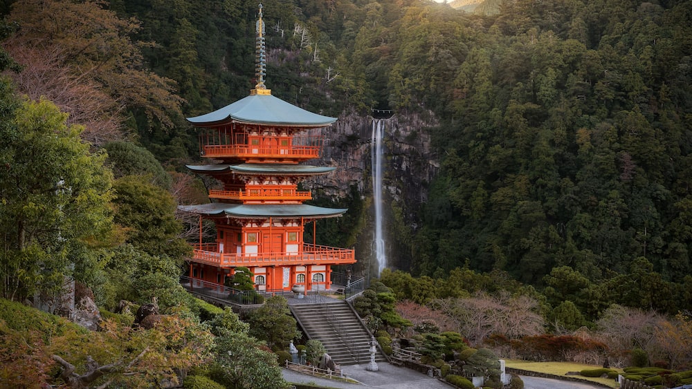 The beautiful scene of Seigantoji pagoda and Nachi no Taki waterfall at early of autumn, Wakayama, Japan